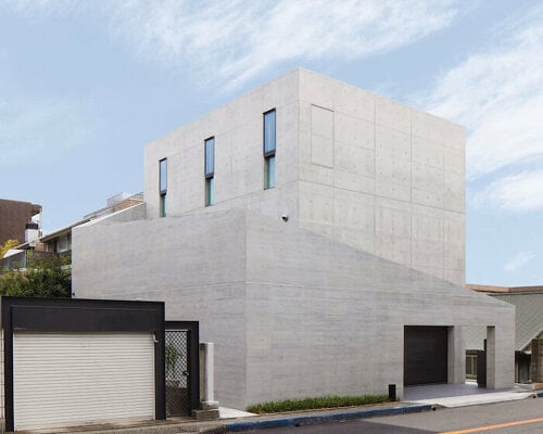 dynamic curtain of concrete walls of varying heights engulfs japanese home in tranquility