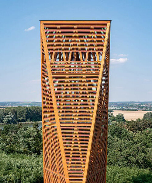 winding timber lookout tower rises above budapest's nature reserve for 360-degree vistas