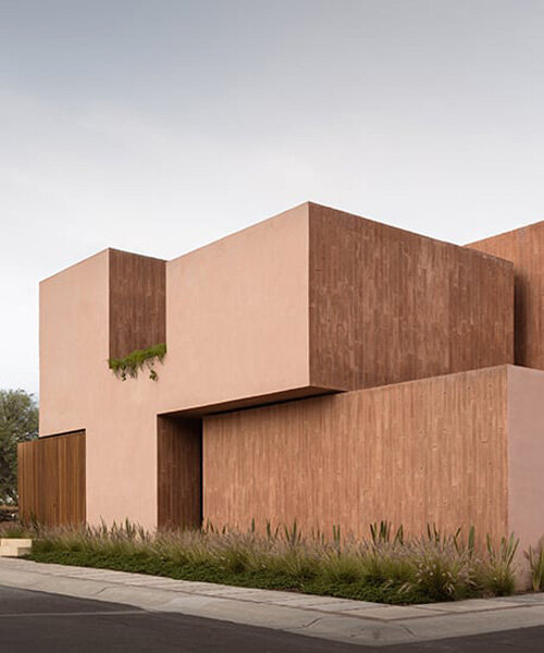 jorge garibay configures brutalist house in mexico as tetris-like pink concrete volumes