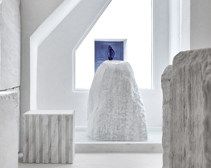 saint of athens devises boutique store in mykonos as a white marble quarry