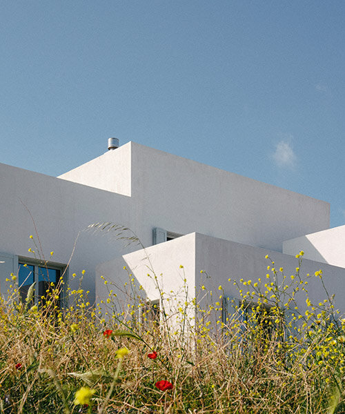 sigurd larsen sculpts interconnected cubes for single house on rocky greek island