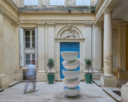 vicente spínola's totem installation stacks reflective semispheres, pondering the climate crisis